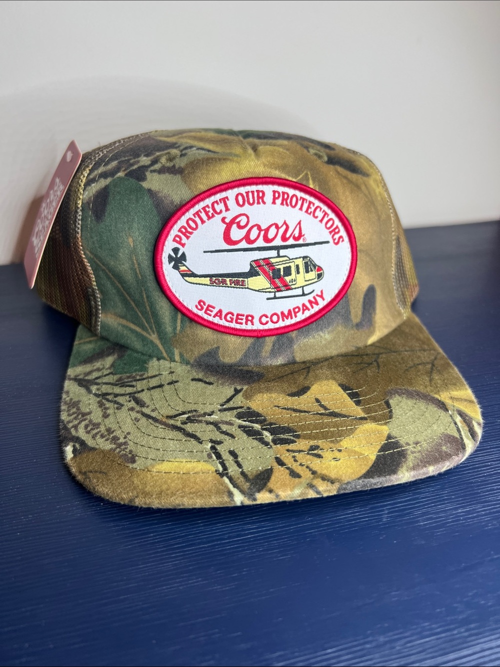 Seager X Coors Banquet Protect Our Protectors Hello Trucker Hat Camo One Size